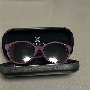 Amiani Purple Sunglasses NWT With Case and cloth
Fast and Free Shipping